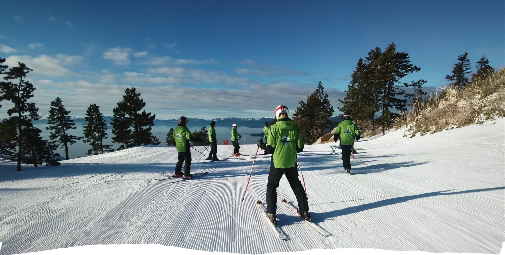 Ski resort team observing the snowy landscape